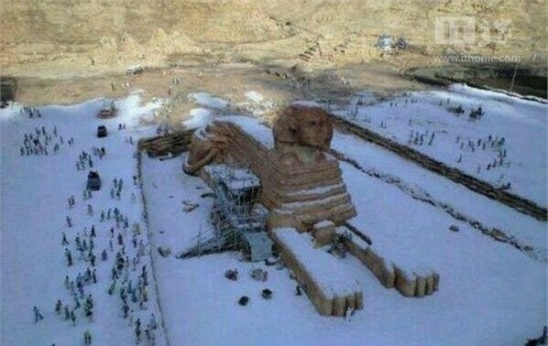 It is the first snow of 112 years in Cairo, Egypt and the Sphinx is covered with snow